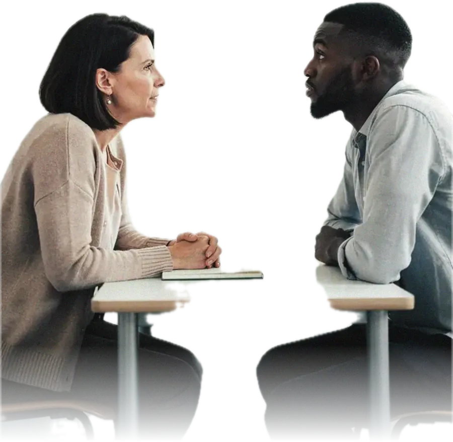 A therapist asking an opening question while the patient answers with an uncertain shrug
